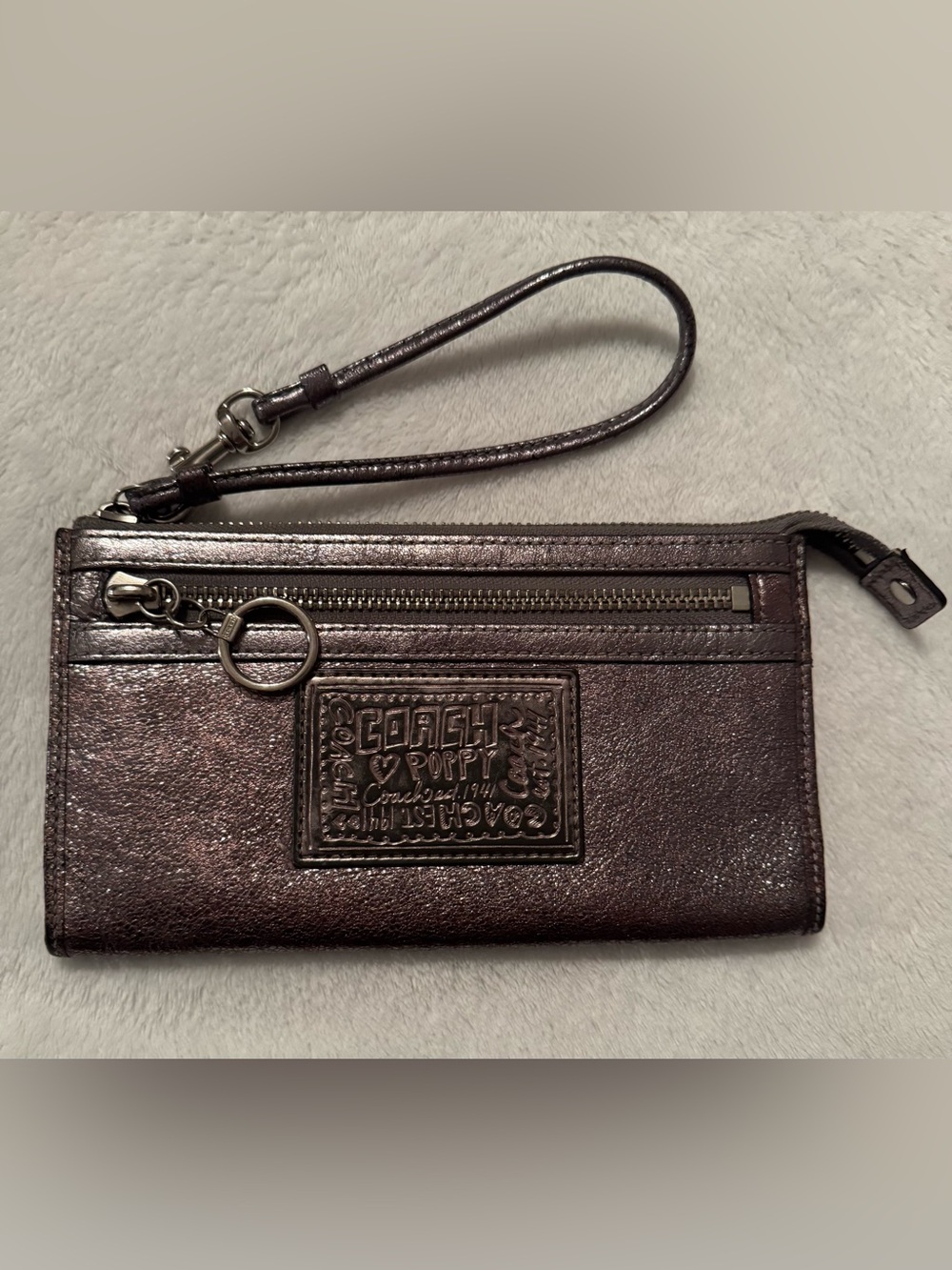 COACH & Poppy Barley Metallic Wristlet in Shimmery Bronze